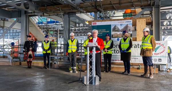 Group of guests at the topping-out