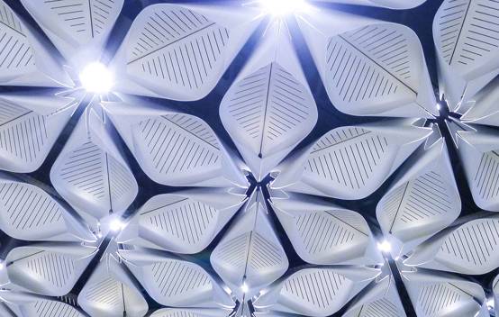 Innovative petal-shaped ceiling panels at Bloomberg HQ that integrate heating, cooling and lighting