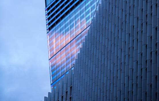 Close-up of the Closed Cavity Facade (CCF) at Fen Court, highlighting the solar shading and high-performance glazing that contribute to the building’s energy efficiency.