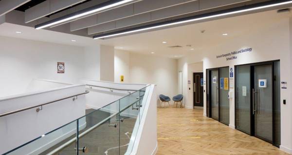 Accessible hallway with improved lighting and directional signage