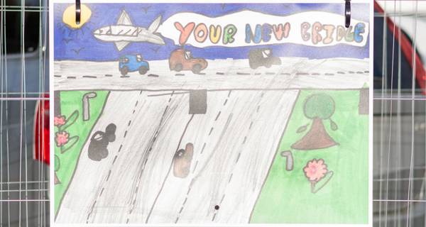 Colourful drawings of the new bridge created by children, showcasing imaginative and vibrant interpretations of the bridge design.