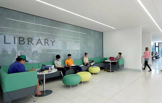 Interior of the refurbished three-storey library at the University of Exeter