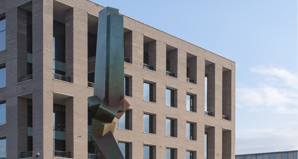 Exterior view of 1 New Park Square, Edinburgh, showcasing the five-storey Grade A office building with exposed concrete facade.