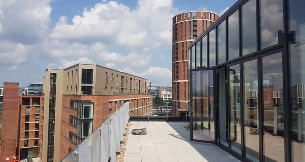 Rooftop view of Mustard Wharf development, overlooking the surrounding South Bank regeneration area in Leeds.