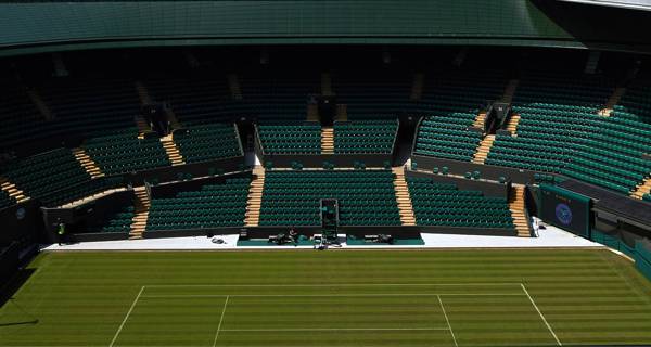 Interior of the 750-seat auditorium at Wimbledon No.1 Court, refurbished with modern seating and acoustic design for optimal spectator experience.