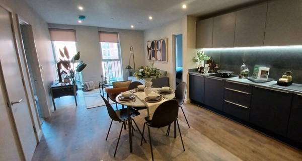 Interior view of a spacious, modern living room in a Tower Works apartment.