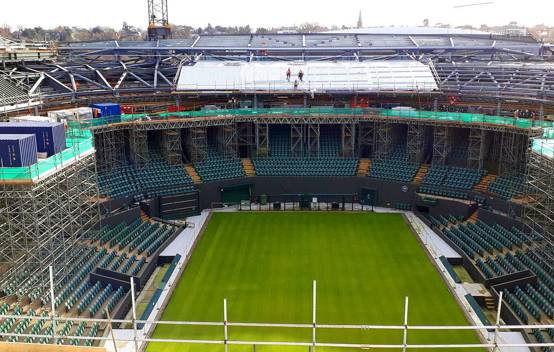 Innovative birdcage scaffold inside Wimbledon's No.1 Court, enabling safe access to M&E systems and ventilation panels below the roof.