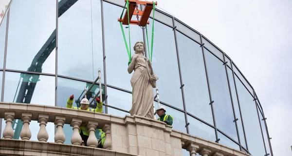 Goddess being craned into place