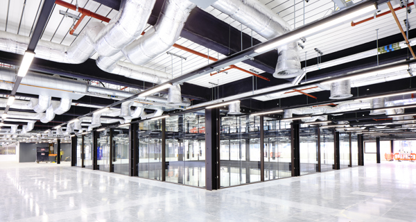 A floor at 1 Finsbury Avenue displaying the building's symmetry and exposed services