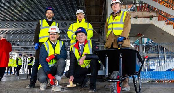 Group photo of key figures at Riverside Sunderland topping out