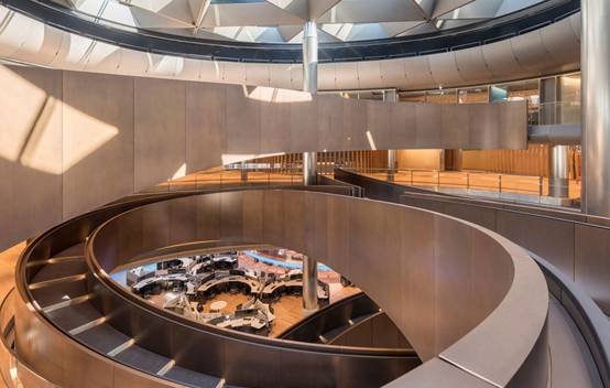 Interior view of the six-story high, bronze-clad spiral ramp at Bloomberg HQ