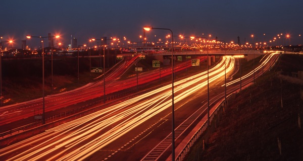 A night scene of the A19, featuring long exposure lights from passing cars and clear signage.