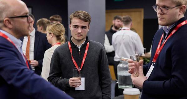 Apprentices talking to head of learning and development Antony Childs