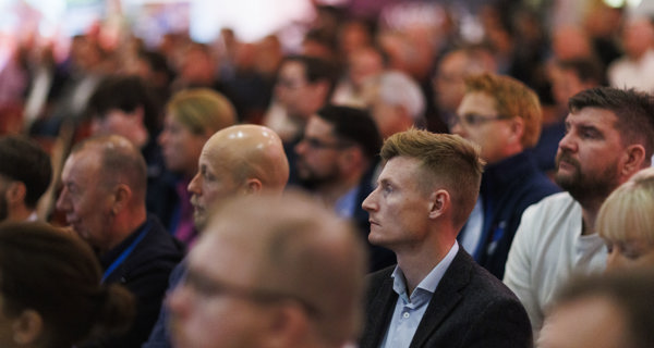 View of attendees seated during a presentation