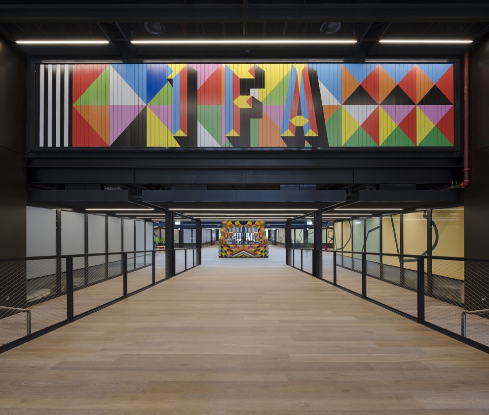 Interior view of the hallway leading to the central atrium at 1 Finsbury Avenue