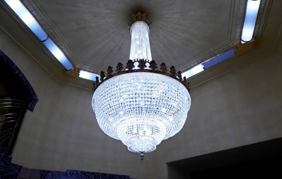 Opulent chandelier at Quadrant 3 reflecting the building's luxurious heritage