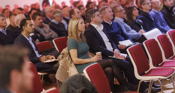 View of attendees seated during a presentation