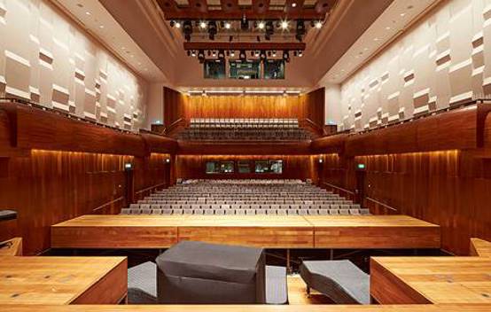 Inside the Guildhall School annexe’s wood-panelled concert hall, with 608 seats arranged in two levels and adjustable acoustics.